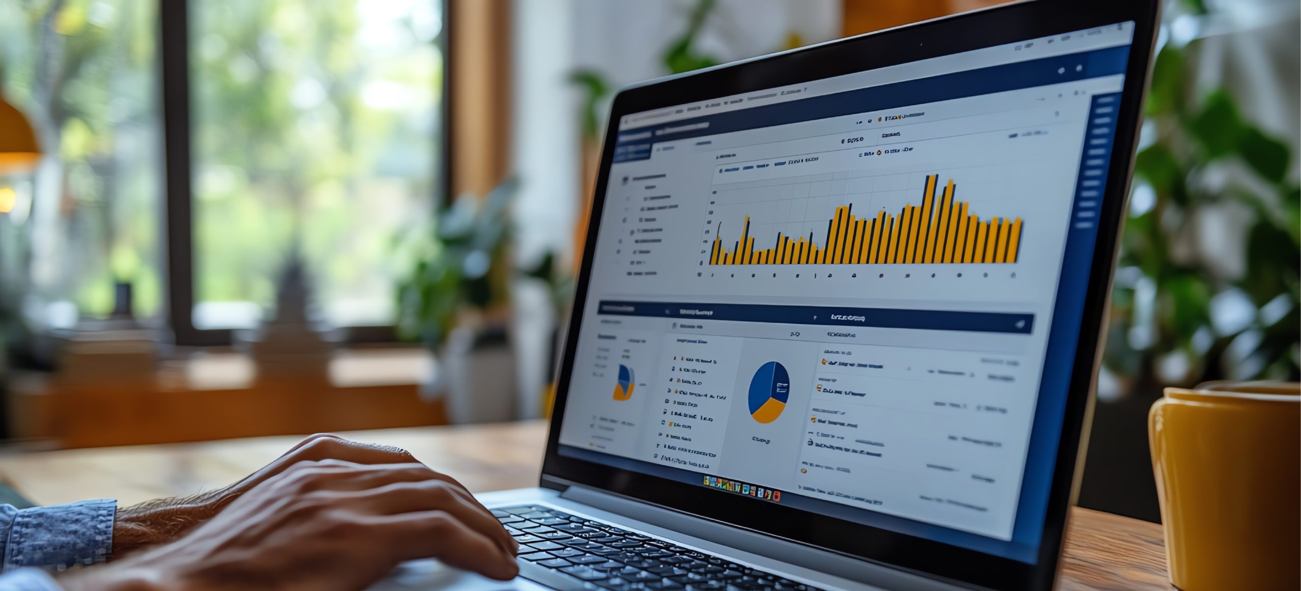 A dealership looks at data on a laptop showing how well their SEO plan is working.