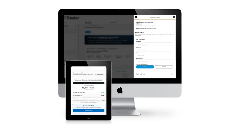 tablet_displaying_trade_in_value_results_screen_next_to_computer_displaying_personal_information_form_at_the_end_of_online_vehicle_purchase%402x.webp